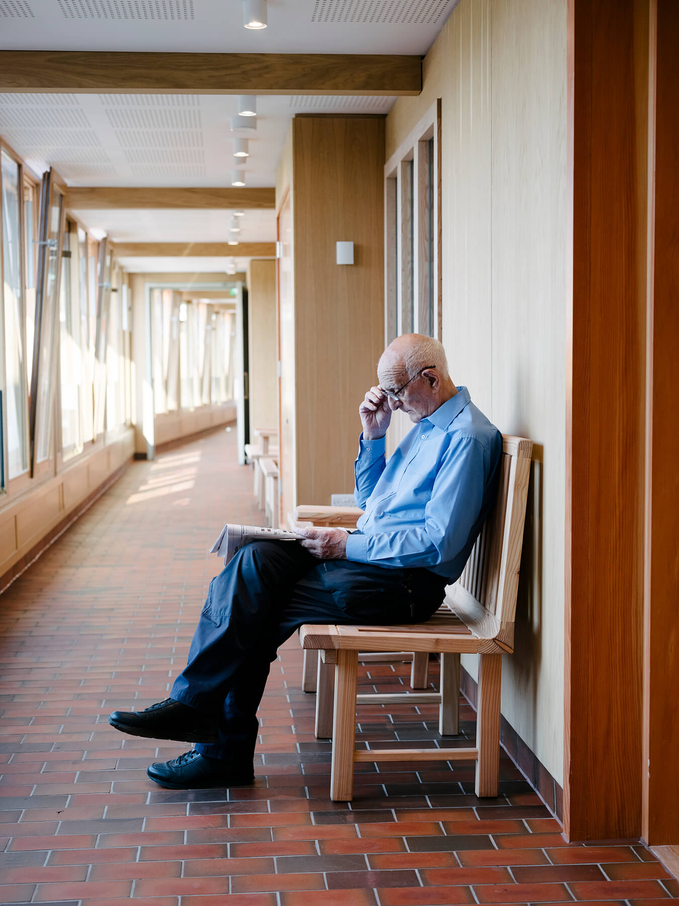 Resident reading at Appleby Blue, a photographic essay by Philipp Ebeling