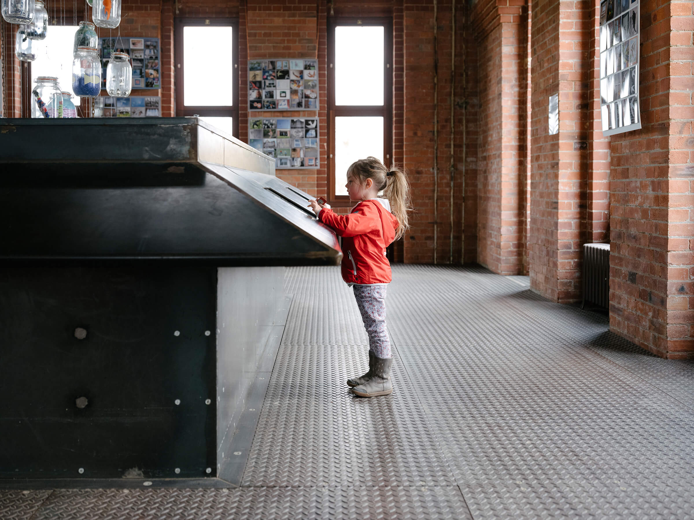 Child interacting with exhibition