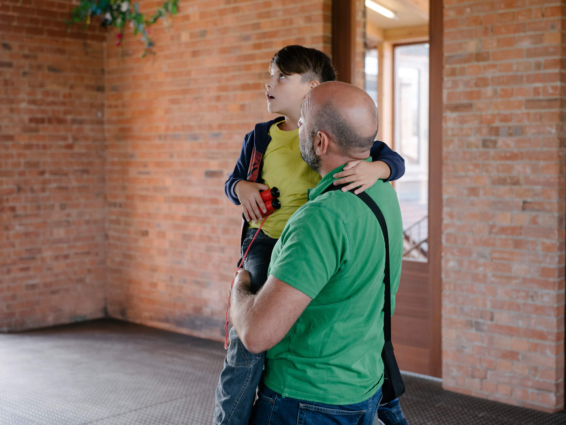 Parent and child explore pumphouse