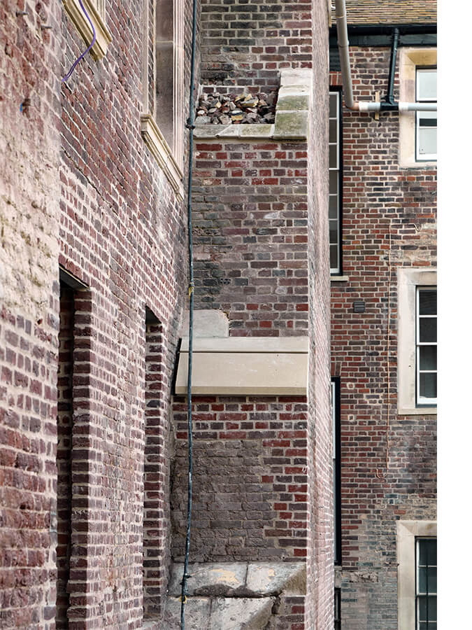 The brick north wall of the Old Court. Photo: Philip Vile