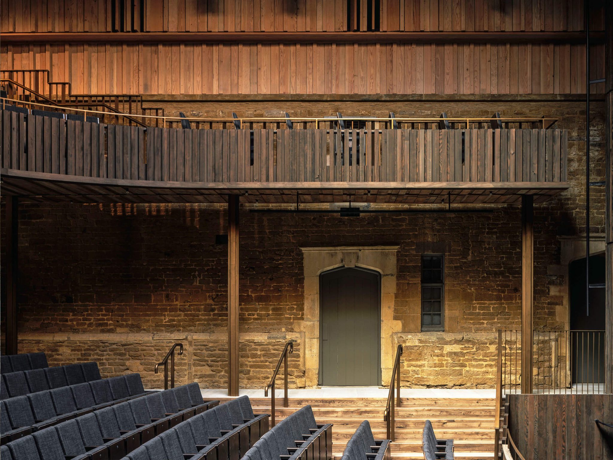 Witherford Watson Mann Architects — Nevill Holt Opean - The stone walls have a strong but gentle presence in the stalls